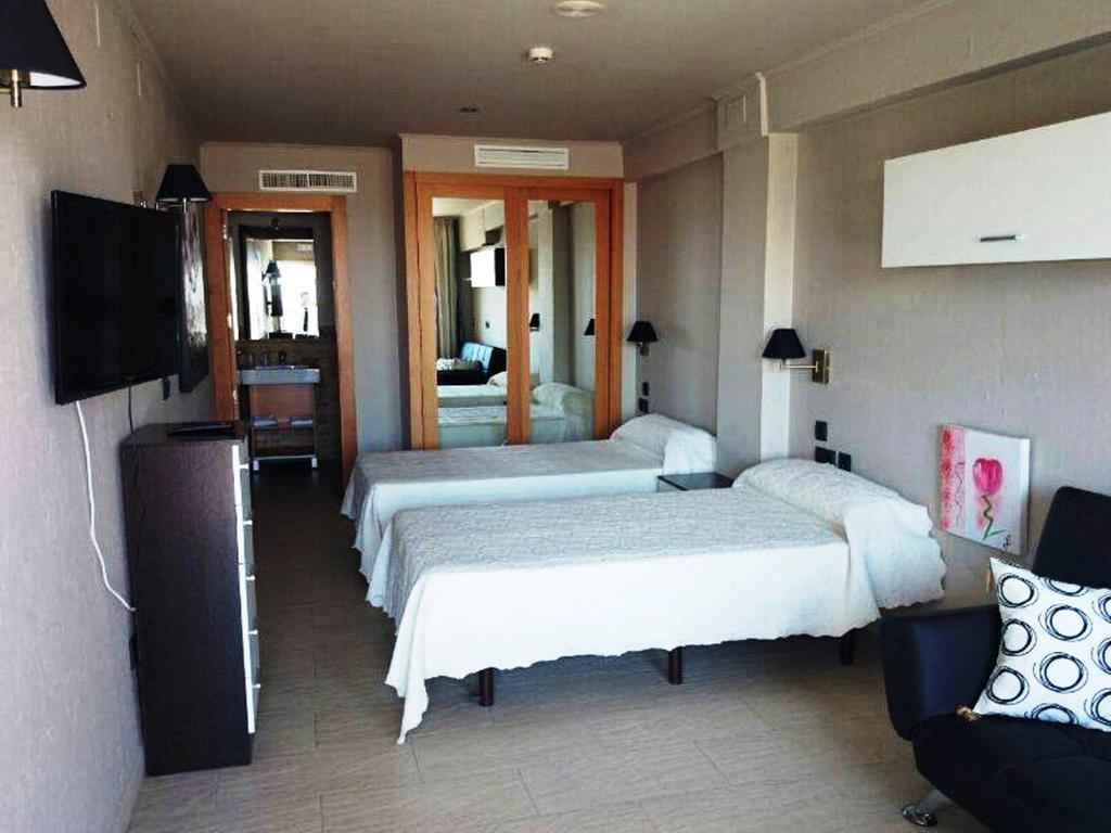 Hostal Playa Мазагон Номер фото